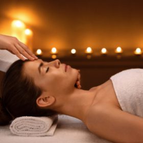 A therapist applying deep pressure during a deep tissue massage, targeting chronic tension and muscle knots in Islamabad.